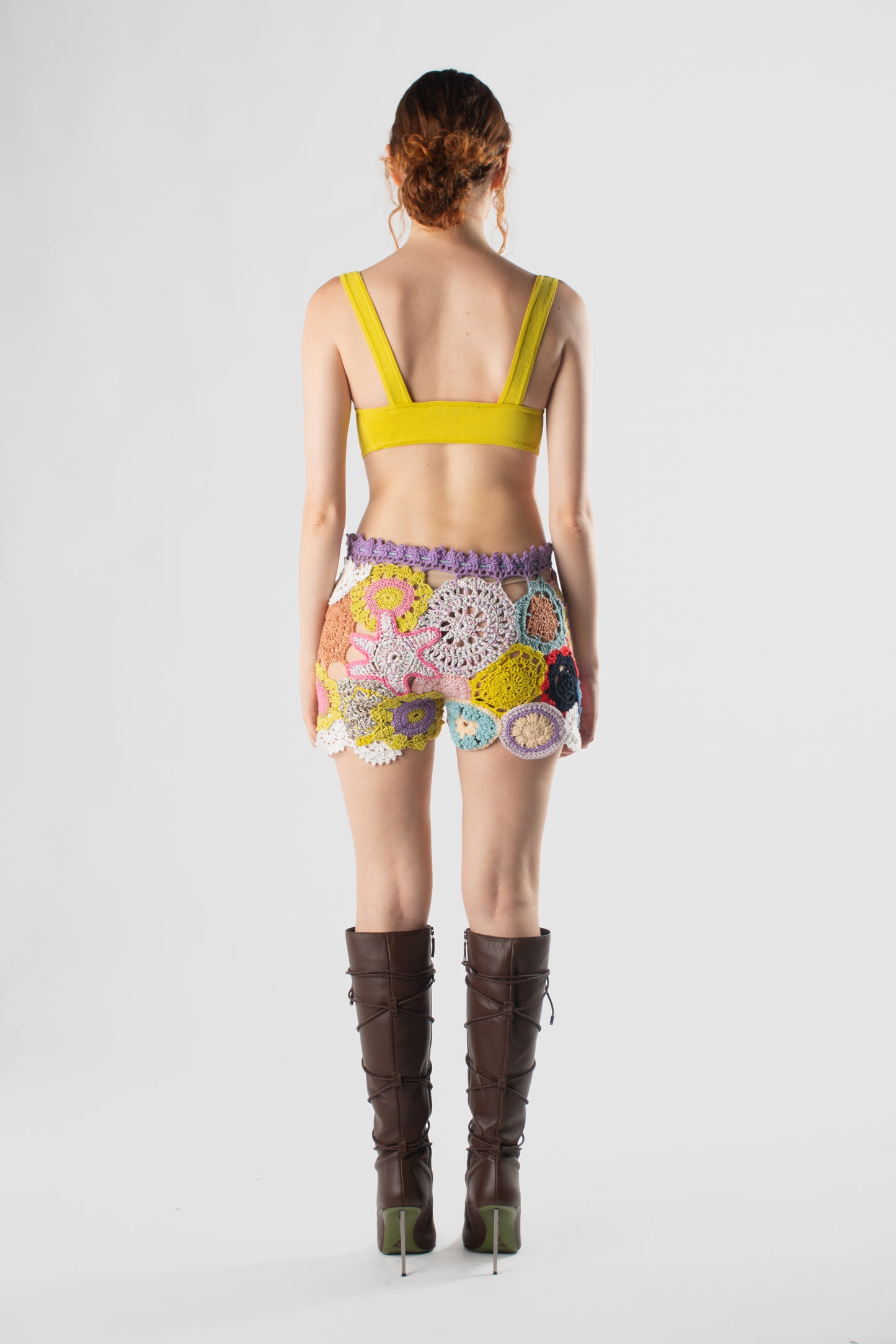 Shorts patch uncinetto